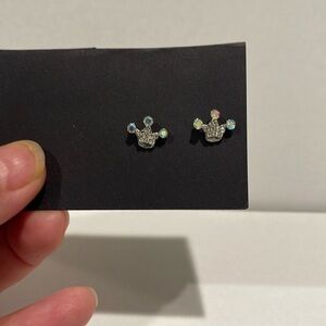 Crown earrings with iridescent crystals.